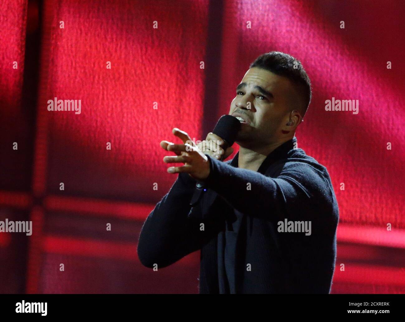Singer Andras Kallay-Saunders representing Hungary performs the song "Running" the grand final of the 59th Song Contest at the B&W Hallerne in Copenhagen May 10, 2014. REUTERS/Tobias Schwarz (DENMARK -