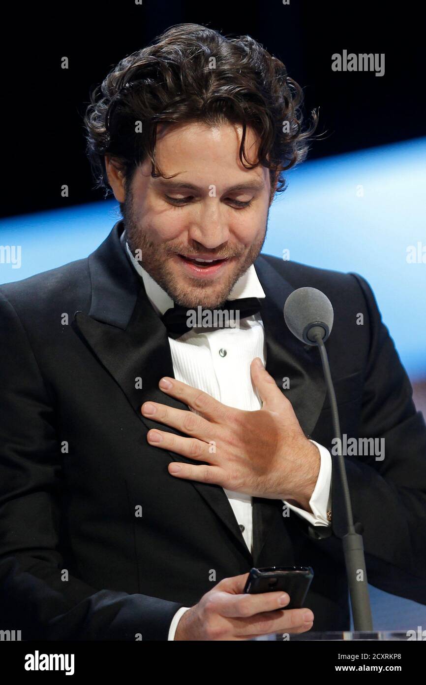 Venezuelan actor Edgar Ramirez reacts after winning the Best Newcomer award  for French director Olivier Assayas' film "Carlos" during the 36th Cesar  Awards ceremony in Paris February 25, 2011. REUTERS/Benoit Tessier (FRANCE -