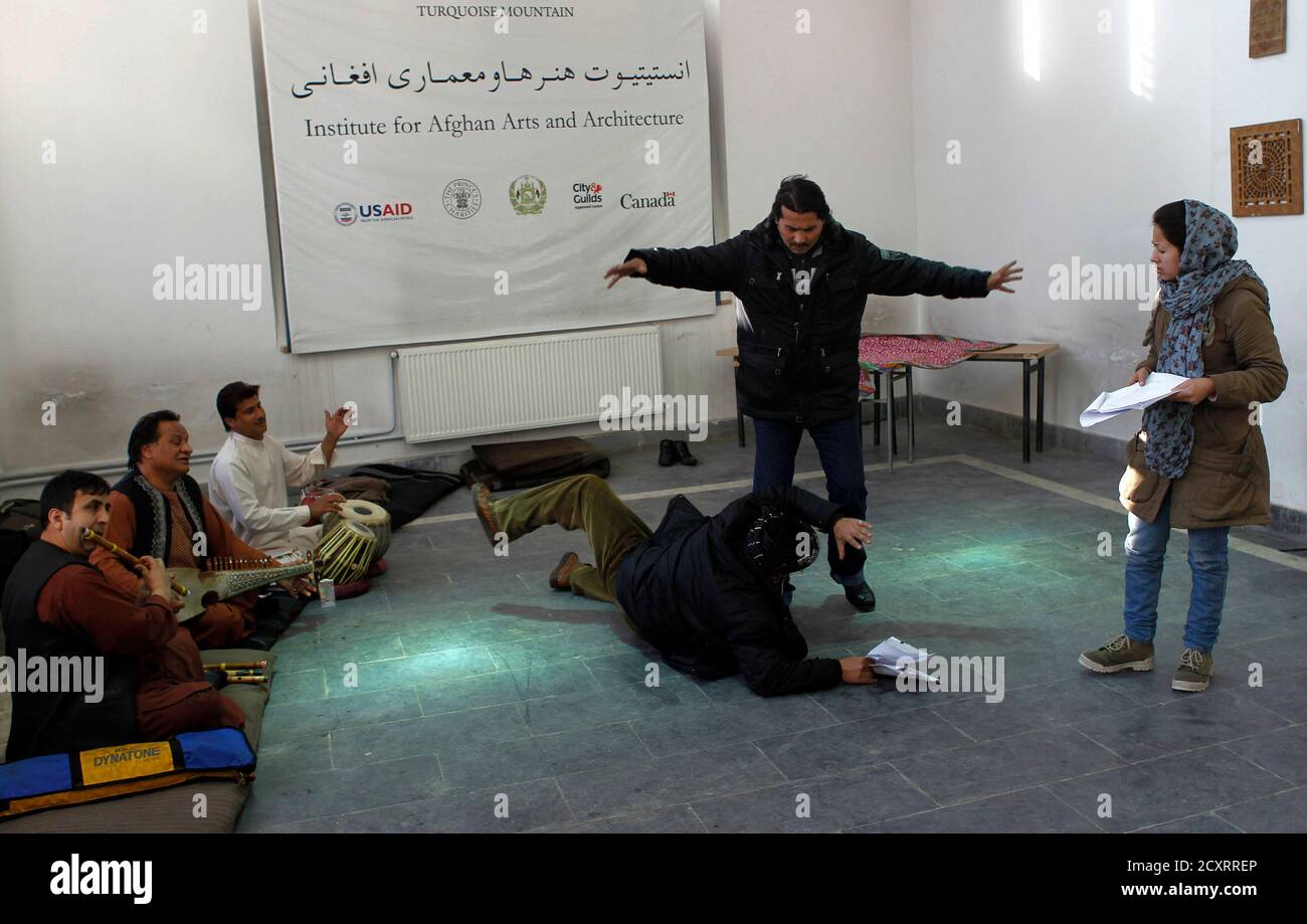 Afghan Actors Perform On Stage During A Theatre Rehearsal In Kabul February 4 2012 A Band Of Afghan Performers Will Be Staging A Play By William Shakespeare In Their Native Dari At