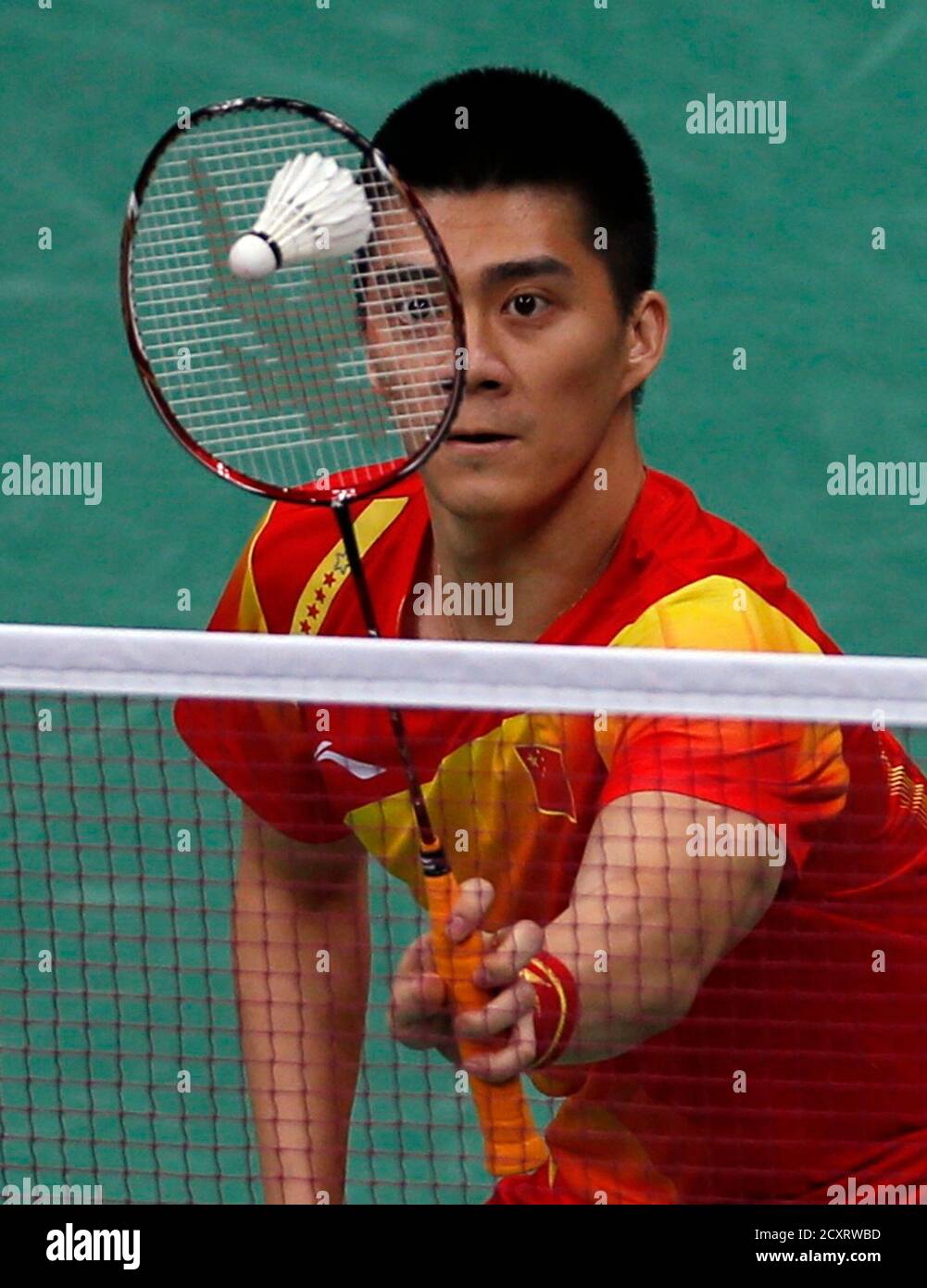 China S Fu Haifeng Returns A Shot During His Men S Doubles Badminton Semifinal Match Against Malaysia At The London 2012 Olympic Games At The Wembley Arena August 4 2012 Reuters Bazuki Muhammad Britain