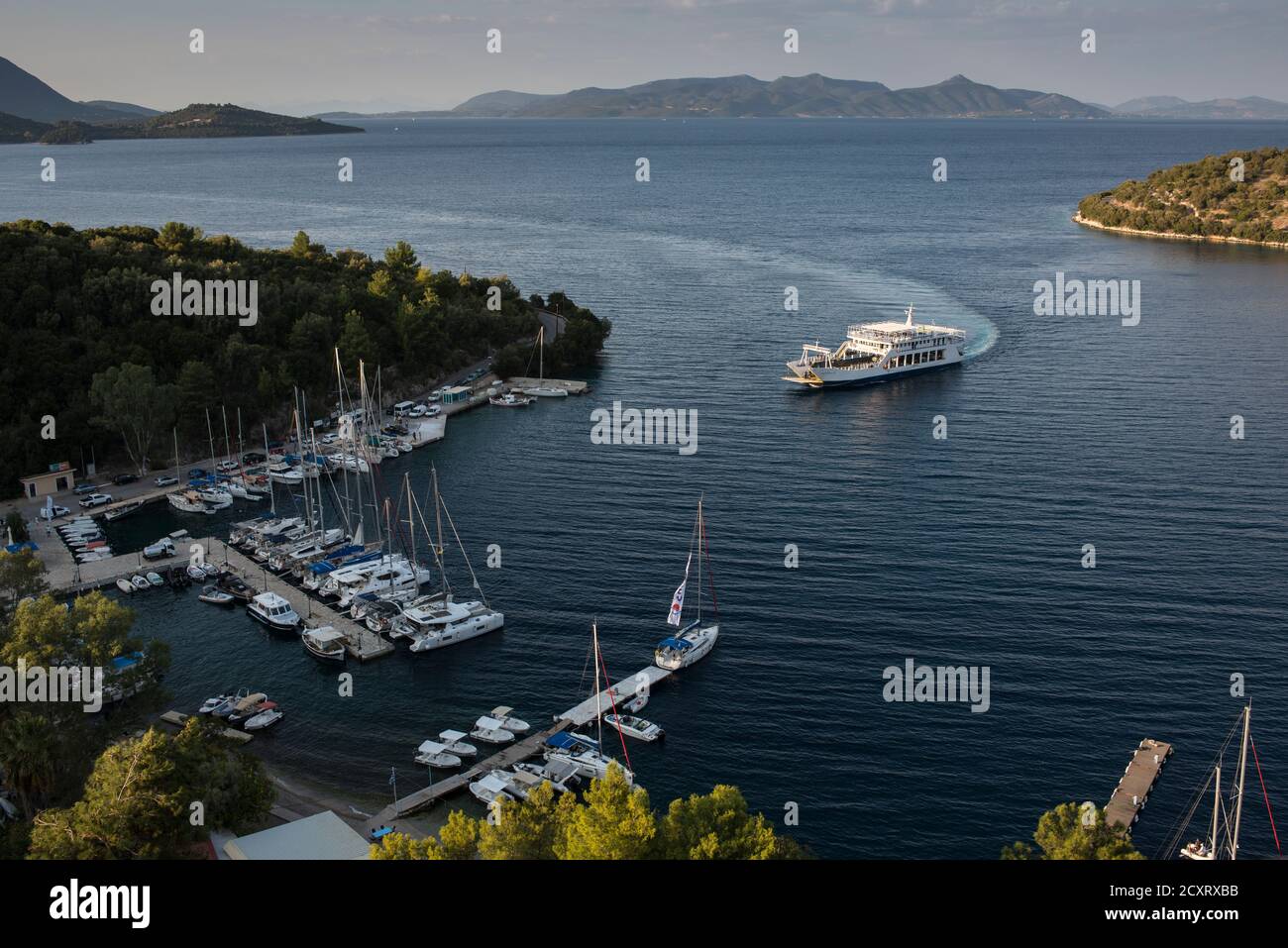 Topshot ferry arriving at port of Spartahori on the Ionian island of Meganisi. Greece Stock Photo
