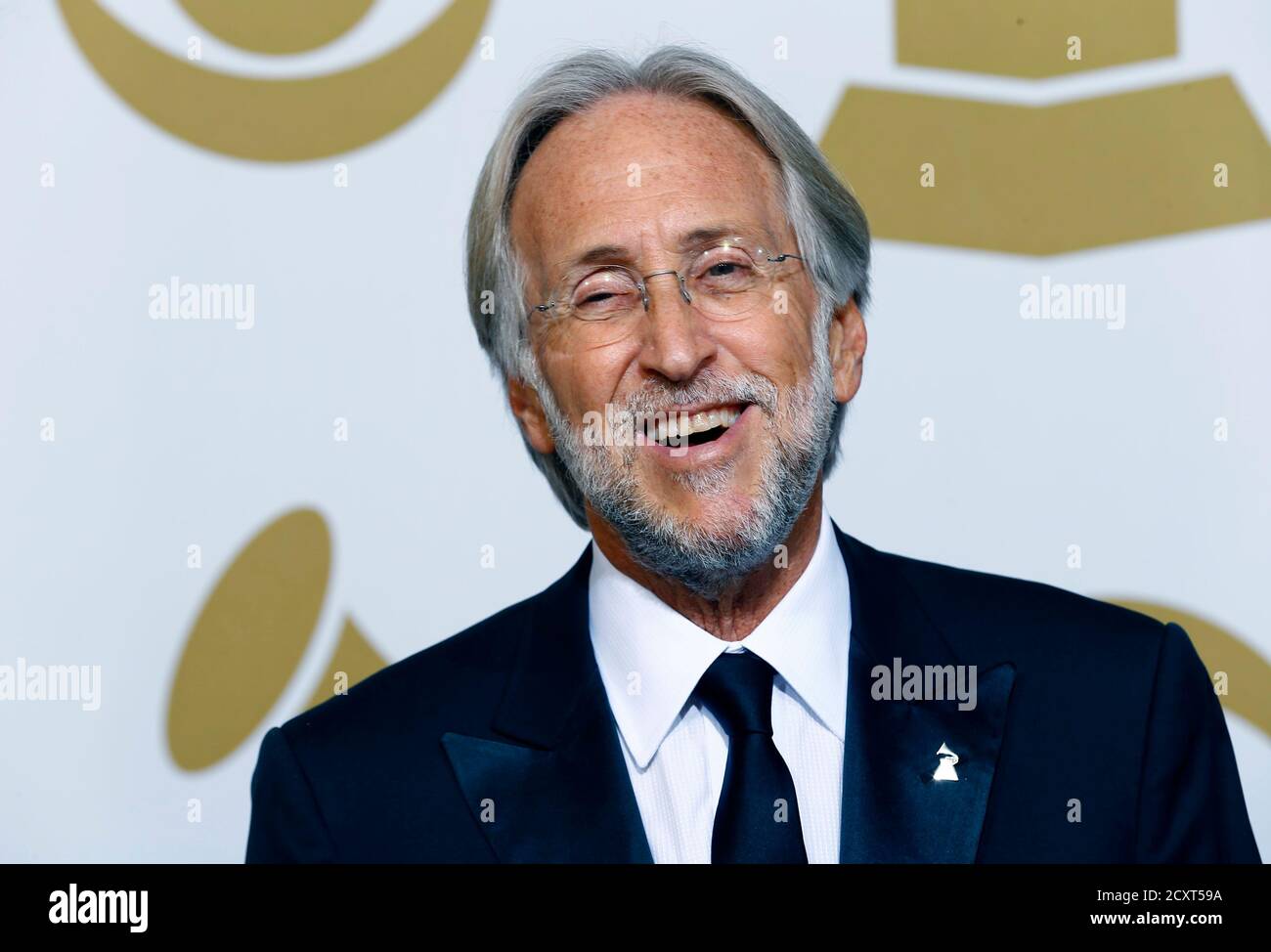 Neil Portnow, president of the National Academy of Recording Arts and Sciences, poses in the press room at the 57th annual Grammy Awards in Los Angeles, California February 8, 2015.  REUTERS/Mike Blake  (UNITED STATES - TAGS: ENTERTAINMENT) (GRAMMYS-BACKSTAGE) Stock Photo