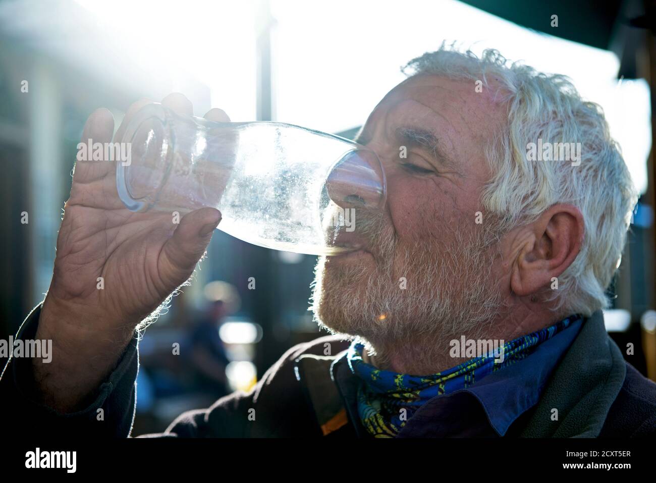 Old man drinking beer hi-res stock photography and images - Alamy