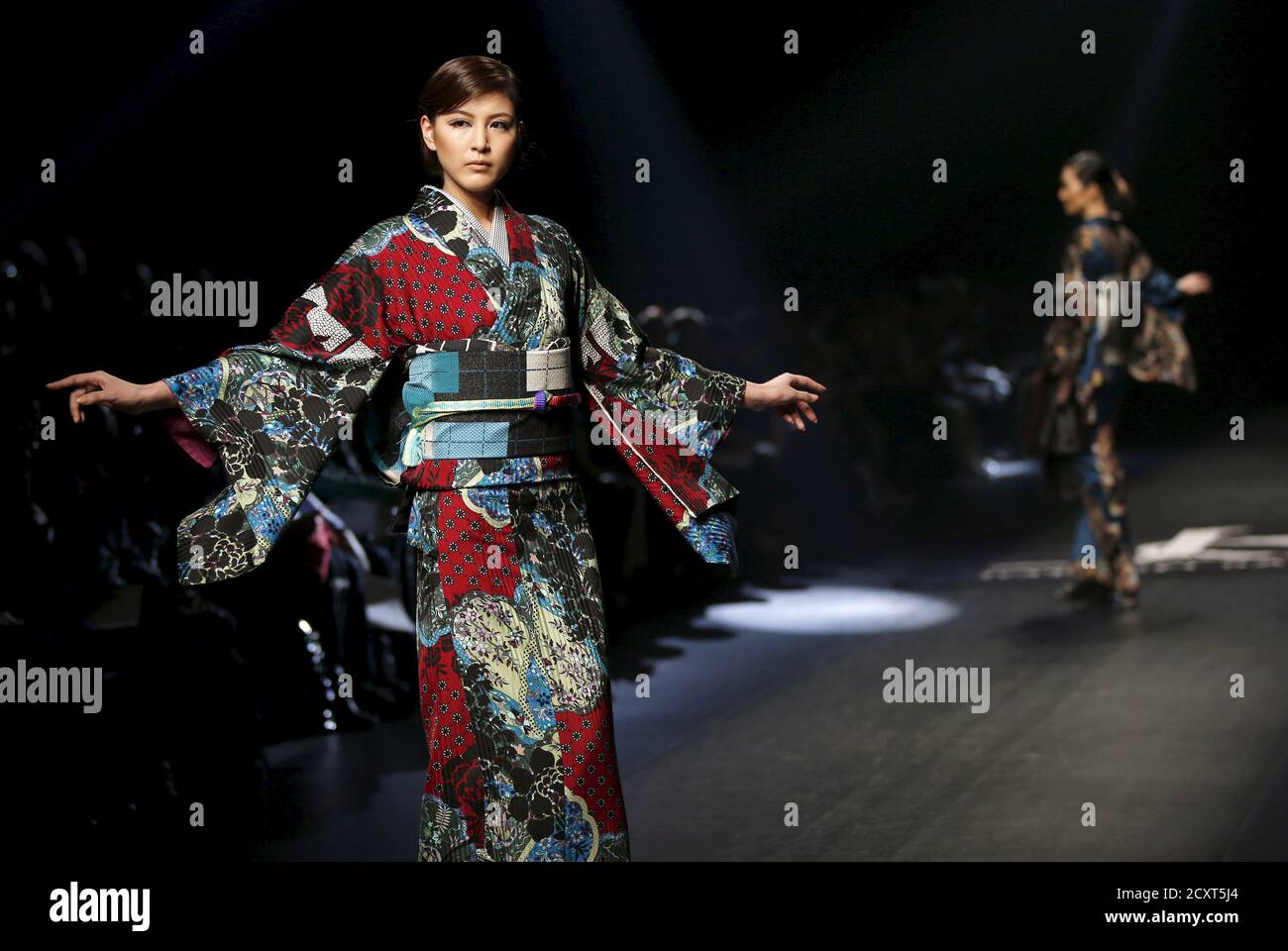 Models present creations by Japanese kimono designer Jotaro Saito at his  Fall/Winter 2015 collection fashion show during Japan Fashion Week in Tokyo  March 19, 2015. REUTERS/Toru Hanai Stock Photo - Alamy