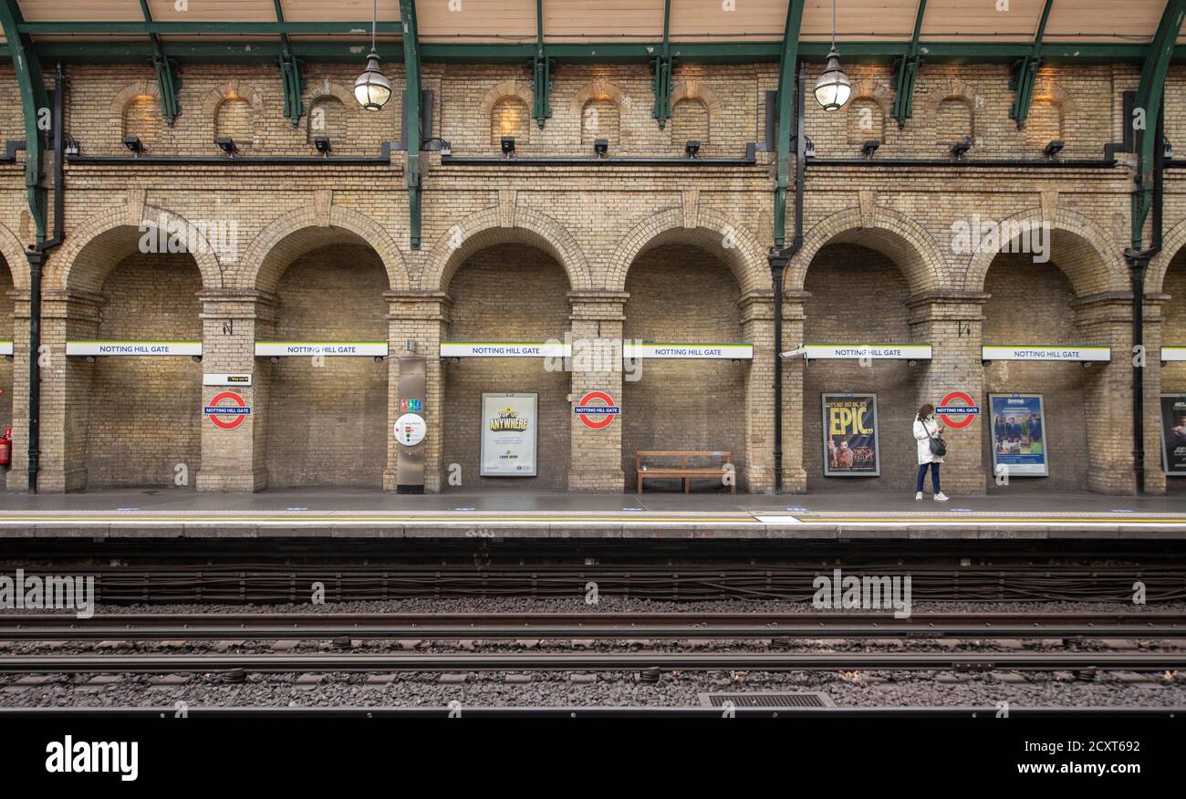 Notting Hill Gate, London, UK. 1 October 2020. Mid morning at Notting Hill Gate underground station with a quiet platform on the District and Circle line as tourists and many commuters continue to stay away from central London during the prolongued Coronavirus pandemic scare. Credit: Malcolm Park/Alamy Live News. Stock Photo