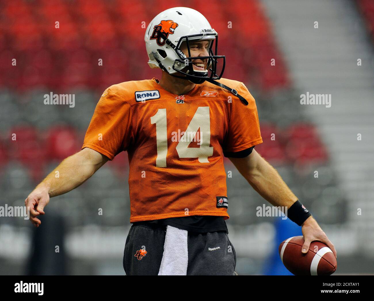 BC Lions' quarterback Travis Lulay smiles during their practice at the start of Grey Cup week in Vancouver, British Columbia, November 23, 2011. The Winnipeg Blue Bombers will play the BC Lions at BC Place in the CFL's 99th Grey Cup football game on Sunday. REUTERS/Todd Korol (CANADA - Tags: SPORT FOOTBALL) Stock Photo