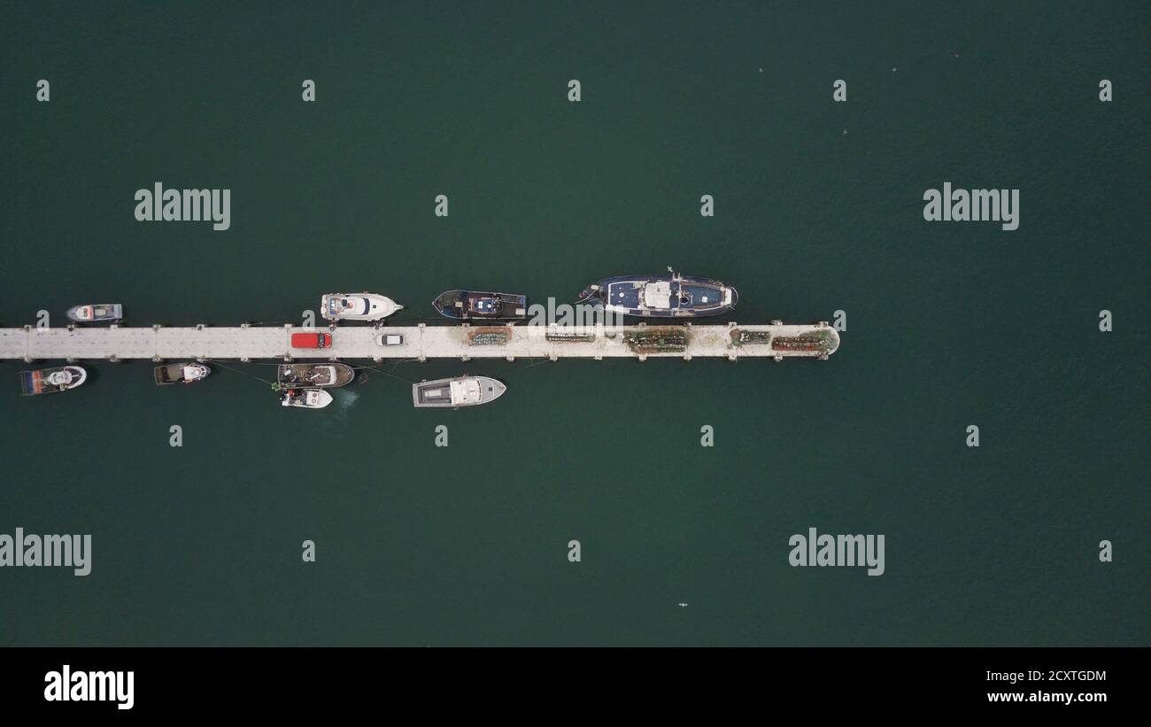 Boats parked at the harbor Stock Photo - Alamy