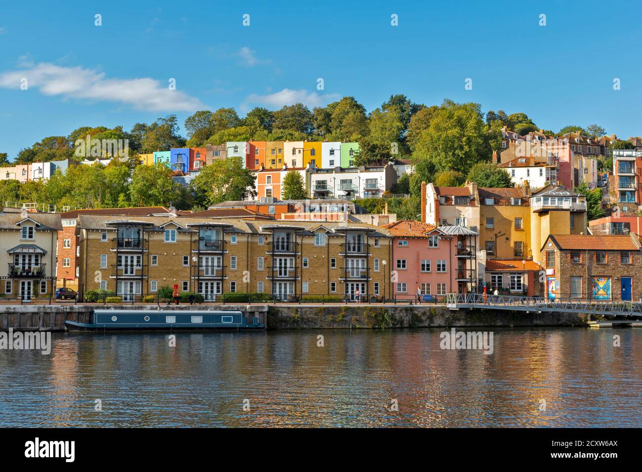 BRISTOL CITY ENGLAND HOTWELLS DOCKS THE COLOURED HOUSES OF CLIFTON WOOD AND AMBRA VALE AND WATERSIDE HOUSES OF ROWNHAM MEAD POOLES WHARF AREA Stock Photo