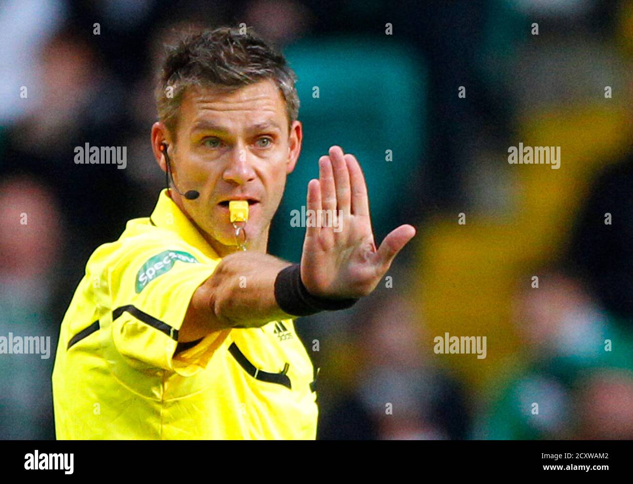 Referee Alain Hamer from Luxembourg gestures during the Scottish Premier  League soccer match between Celtic and Inverness Caley Thistle in Glasgow,  Scotland November 27, 2010. For the first time in Scotland match