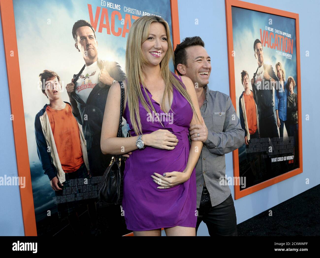 Actor David Faustino (R) and pregnant girlfriend Lindsay Bronson pose during the premiere of the film 'Vacation' at the Regency Village Theatre in the Westwood section of Los Angeles, California July 27, 2015. REUTERS/Kevork Djansezian Stock Photo