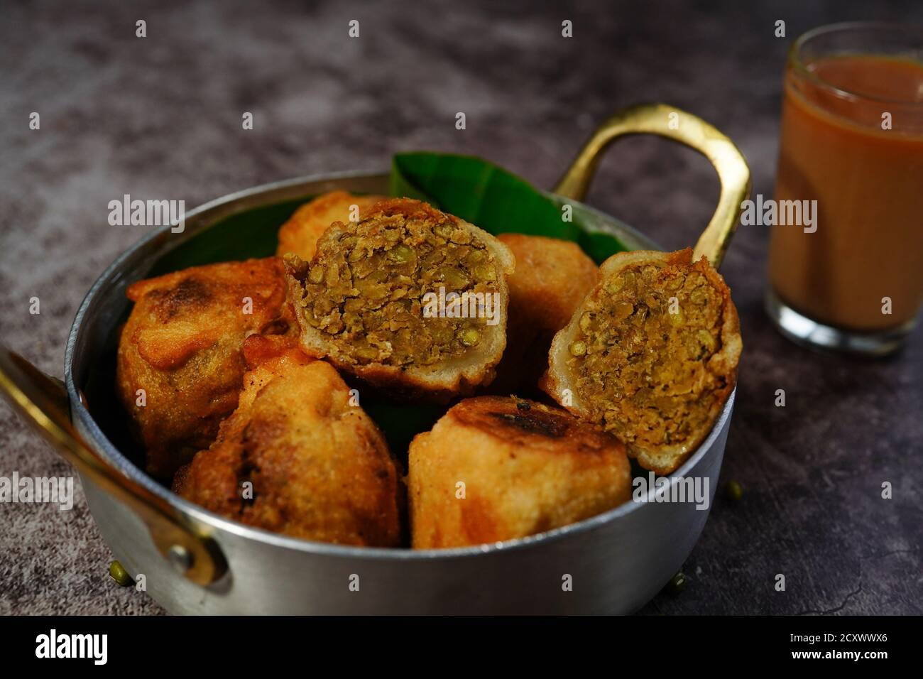 Sukhiyan - Kerala deep fried tea time snack with green gram filling, selective focus Stock Photo
