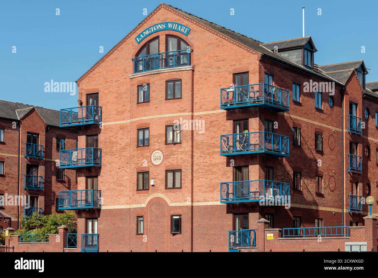 View Langtons Wharf, riverside warehouse refurbished as apartments in Leeds City Centre Stock Photo