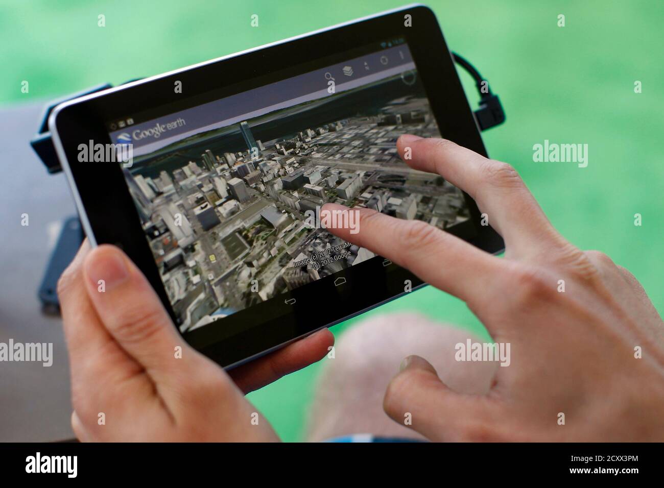 An attendee uses Google Map on a Google Nexus 7 tablet during Google I/O  2012 Conference at Moscone Center in San Francisco, California June 27,  2012. Google Inc unveiled its first tablet