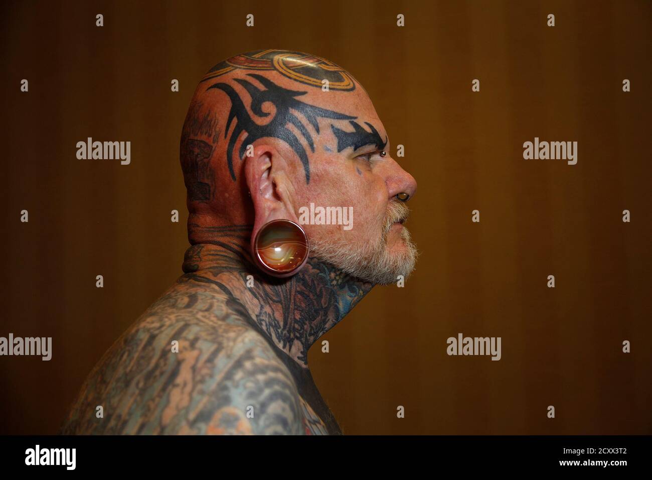 Robert Seibert, 62, from Burlington, Kentucky, shows off his full body of  tattoos, including the tribal-inspired designs he has accumulated over 40  years, during the National Tattoo Association Convention in Cincinnati, Ohio