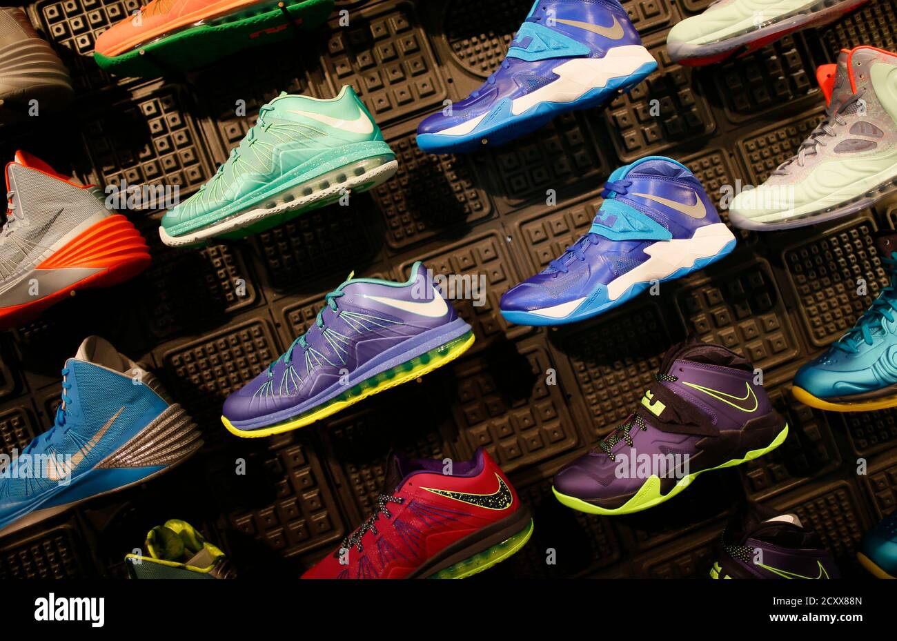 Shoes are displayed in the Nike store in Santa Monica, California,  September 25, 2013. NIKE, Inc. plans to release its first quarter fiscal  2014 financial results on Thursday, September 26, 2013. REUTERS/Lucy