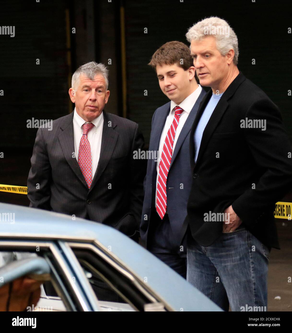 Police officer look into a car hires stock photography and images Alamy
