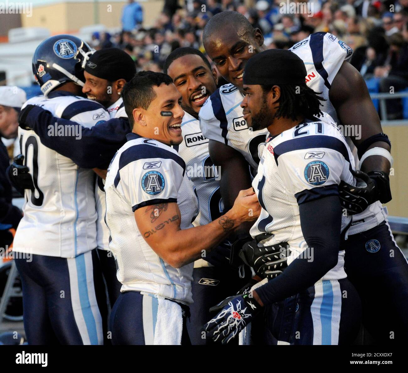 Toronto Argonauts Chad Owens 3rd L Celebrates With Lin J Shell 21 And Other Teammates After Defeating The Winnipeg Blue Bombers During Canadian Football League Action In Winnipeg October 23 10 Reuters Fred Greenslade