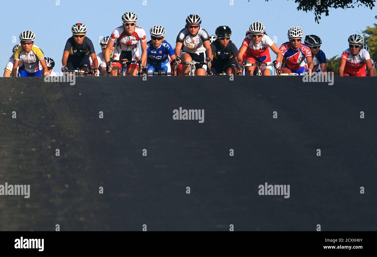 Cyclists compete in the women's road race cycling competition at the Pan American Games in Guadalajara, October 22, 2011.   REUTERS/Jose Miguel Gomez    (MEXICO - Tags: SPORT CYCLING) Stock Photo