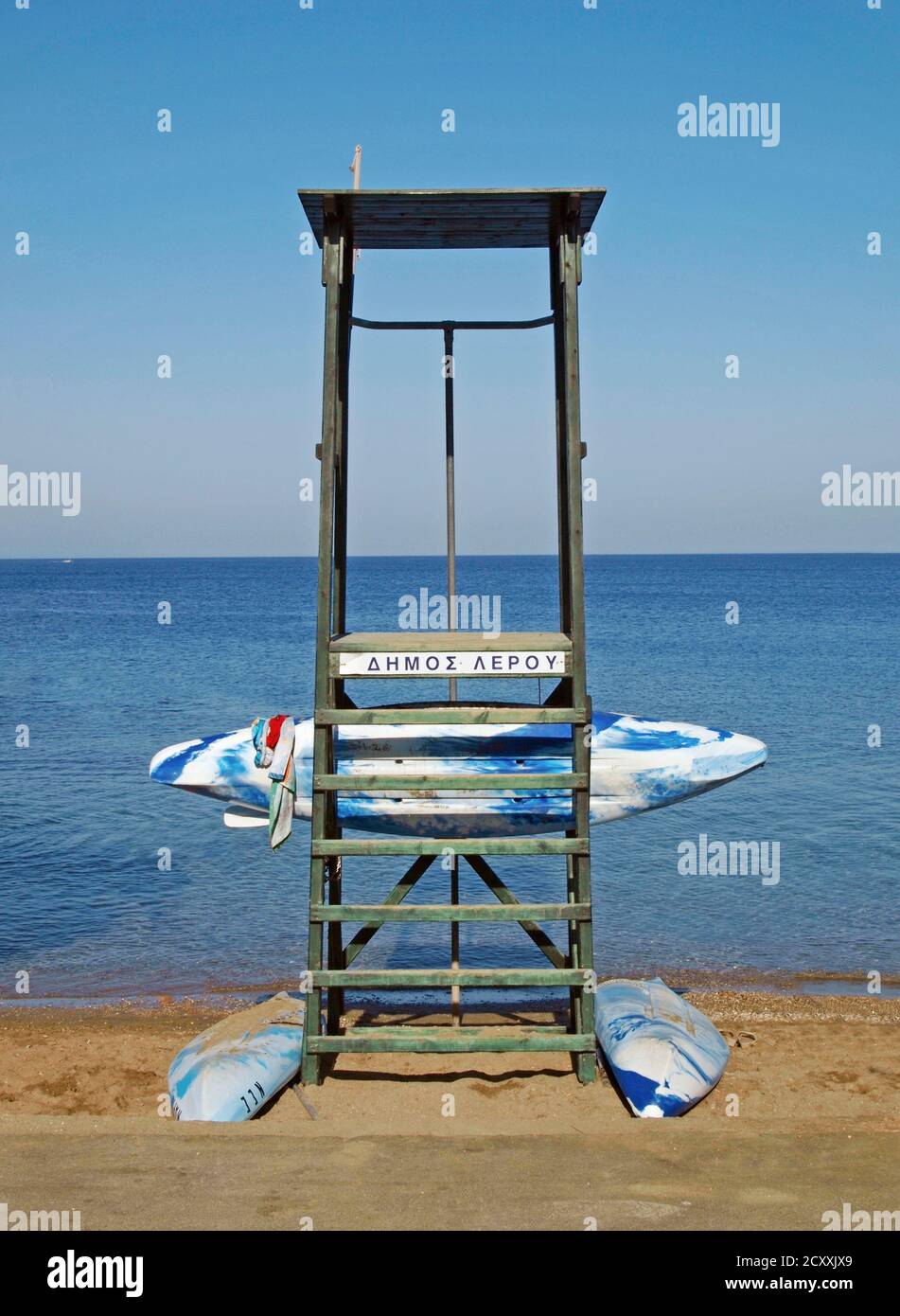 lifeguard tower and surfboards, Leros, Greece Stock Photo