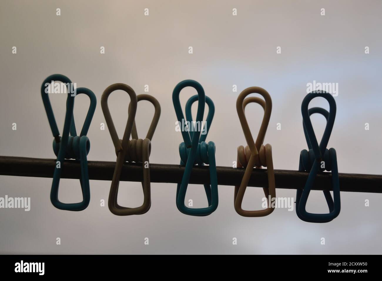 clothes clips hanging on a wire in a house of Kathmandu, Stock Photo