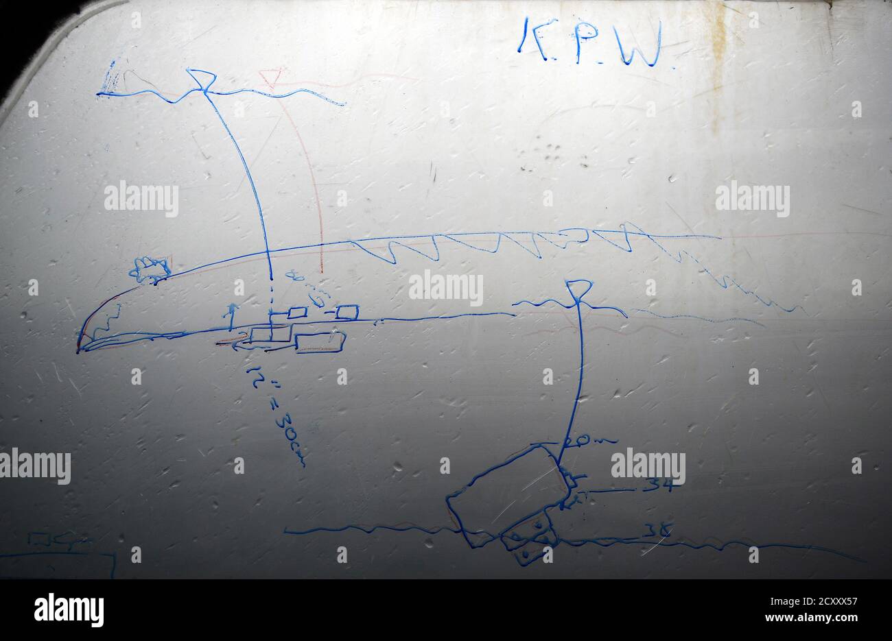 A dive plan of SMS Kronprinz Wilhelm, a German WWI warship, is drawn on the window of a dive boat at Scapa Flow in the Orkney Islands, Scotland May 6, 2014. During both World Wars, Scapa Flow was an important British naval base, and the site of significant loss of life. Following the end of World War One, 74 German warships were interned there, and on June 21, 1919 most were deliberately sunk, or scuttled, at the orders of German Rear Admiral Ludwig Von Reuter, who mistakenly thought that the Armistice had broken down and wanted to prevent the British from using the ships. Now Scapa Flow is a Stock Photo