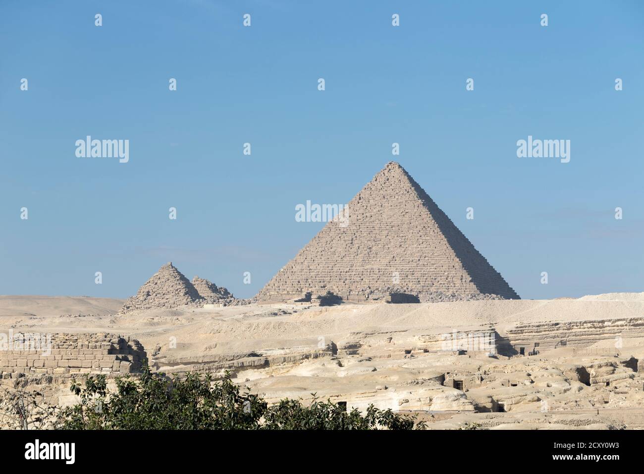 The pyramid of  Menkaure next to the queen's pyramids, Giza, Egypt Stock Photo