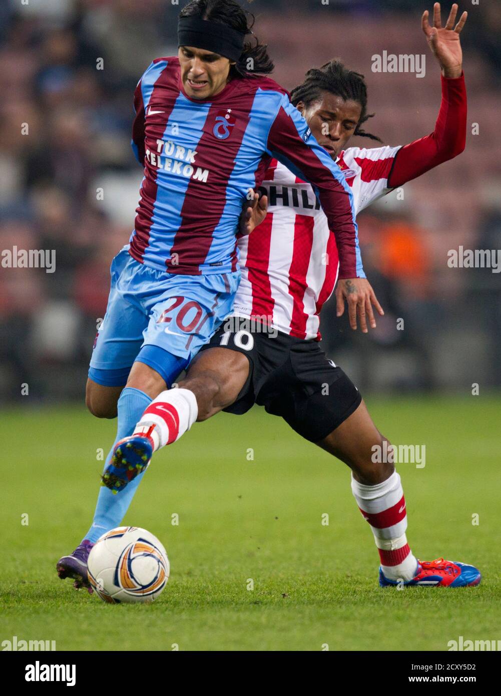 https www alamy com georginio wijnaldum of psv eindhoven r fights for the ball with gustavo colman of trabzonspor during their second leg europa league match in eindhoven february 23 2012 reutersmichael kooren netherlands tags sport soccer image377995774 html