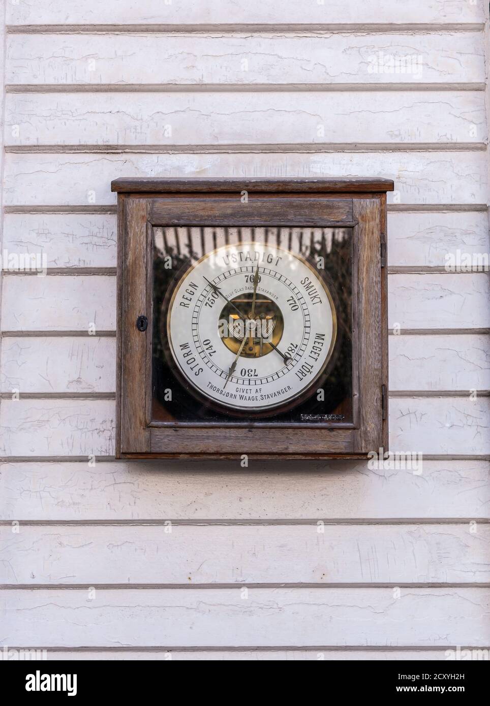 SKUDENESHAVN, NORWAY - 2016 FEBRUARY 26. Old antique Hygrometer Weather station in the centrum of Skudeneshavn Stock Photo