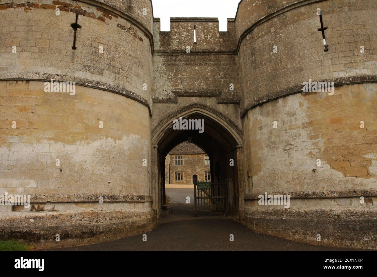 13th century twin D tower gatehouse entrance to Rockingham Castle, England, UK Stock Photo