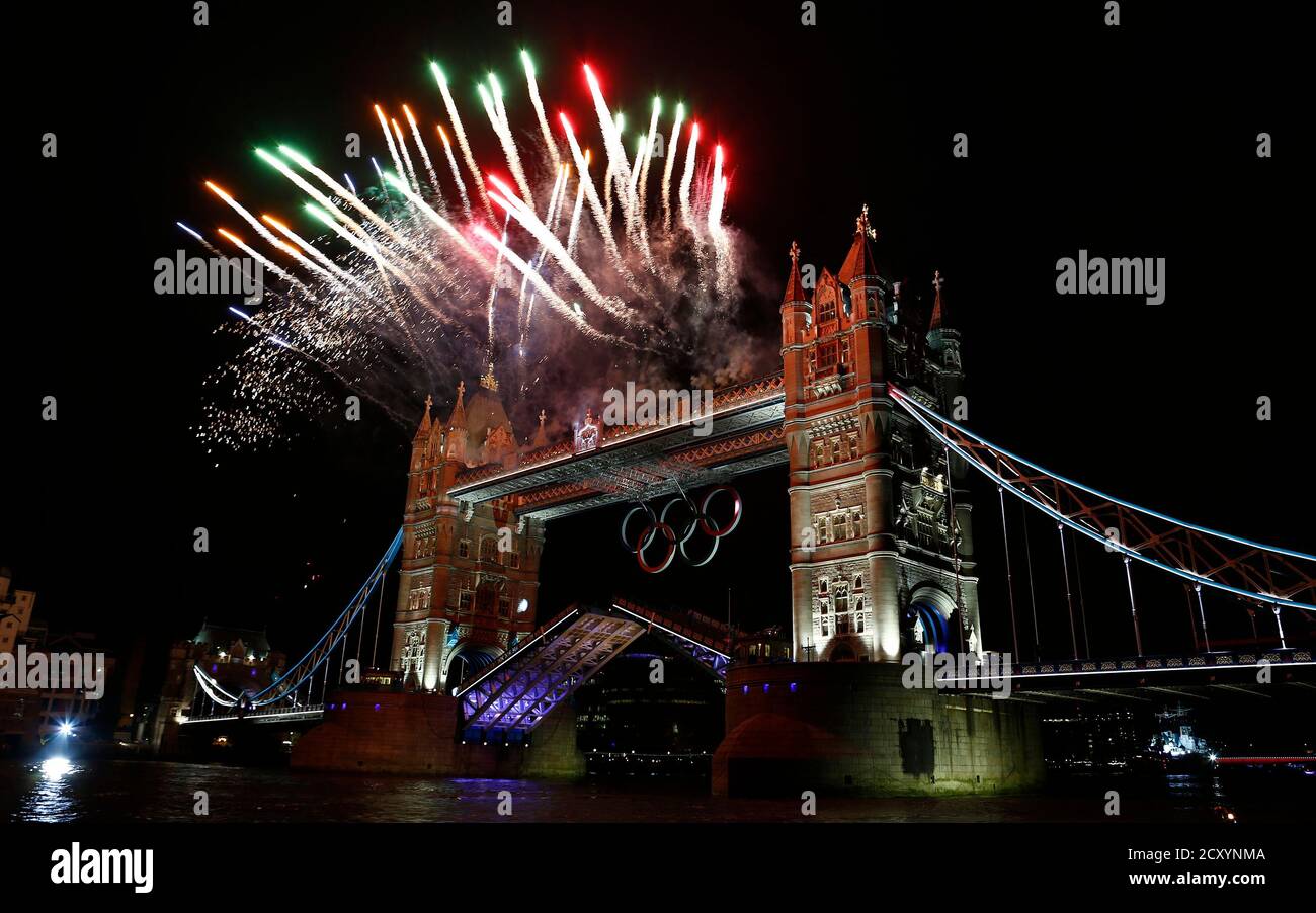 Fireworks are launched over Tower Bridge during the opening ceremony of the London 2012 Olympic Games July 27, 2012.     REUTERS/Eddie Keogh (BRITAIN - Tags: SPORT OLYMPICS) Stock Photo