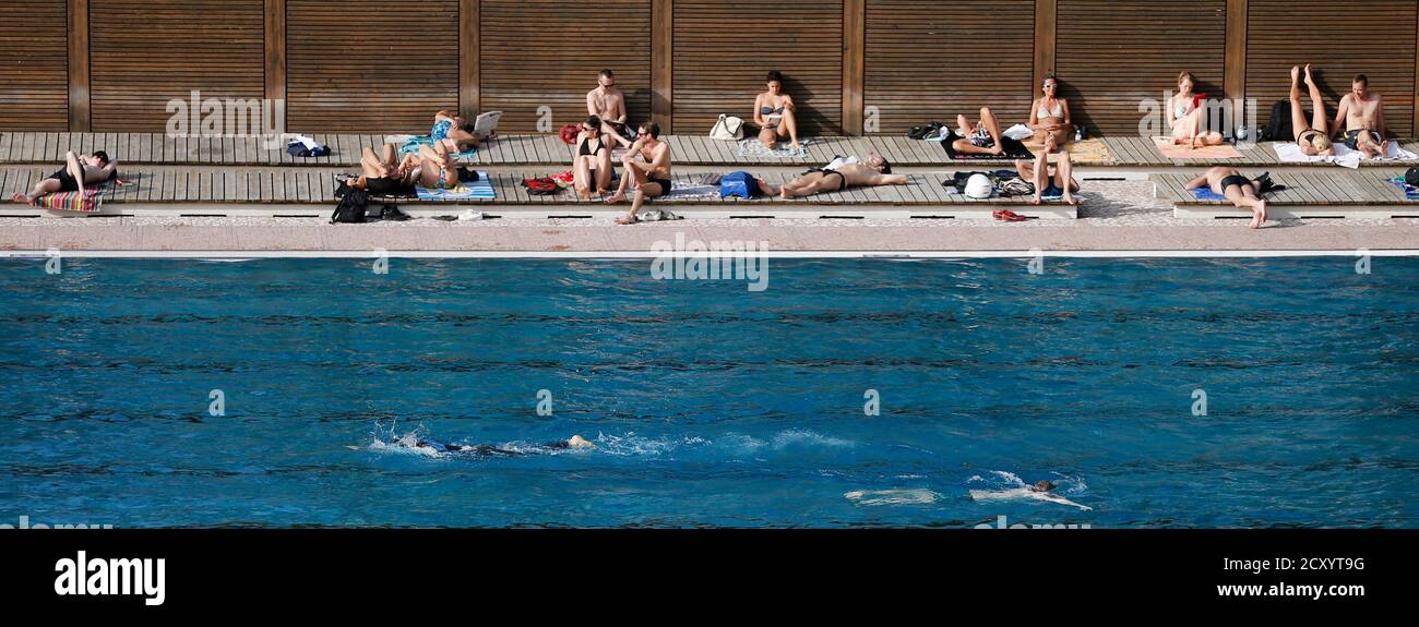 People Relax At The Public Swimming Pool Of Schoenbrunner Bad On A Sunny Day In Vienna April 26 2013 Vienna Has Been Hit By Unusually Warm Temperatures Of Up To 28 Degrees