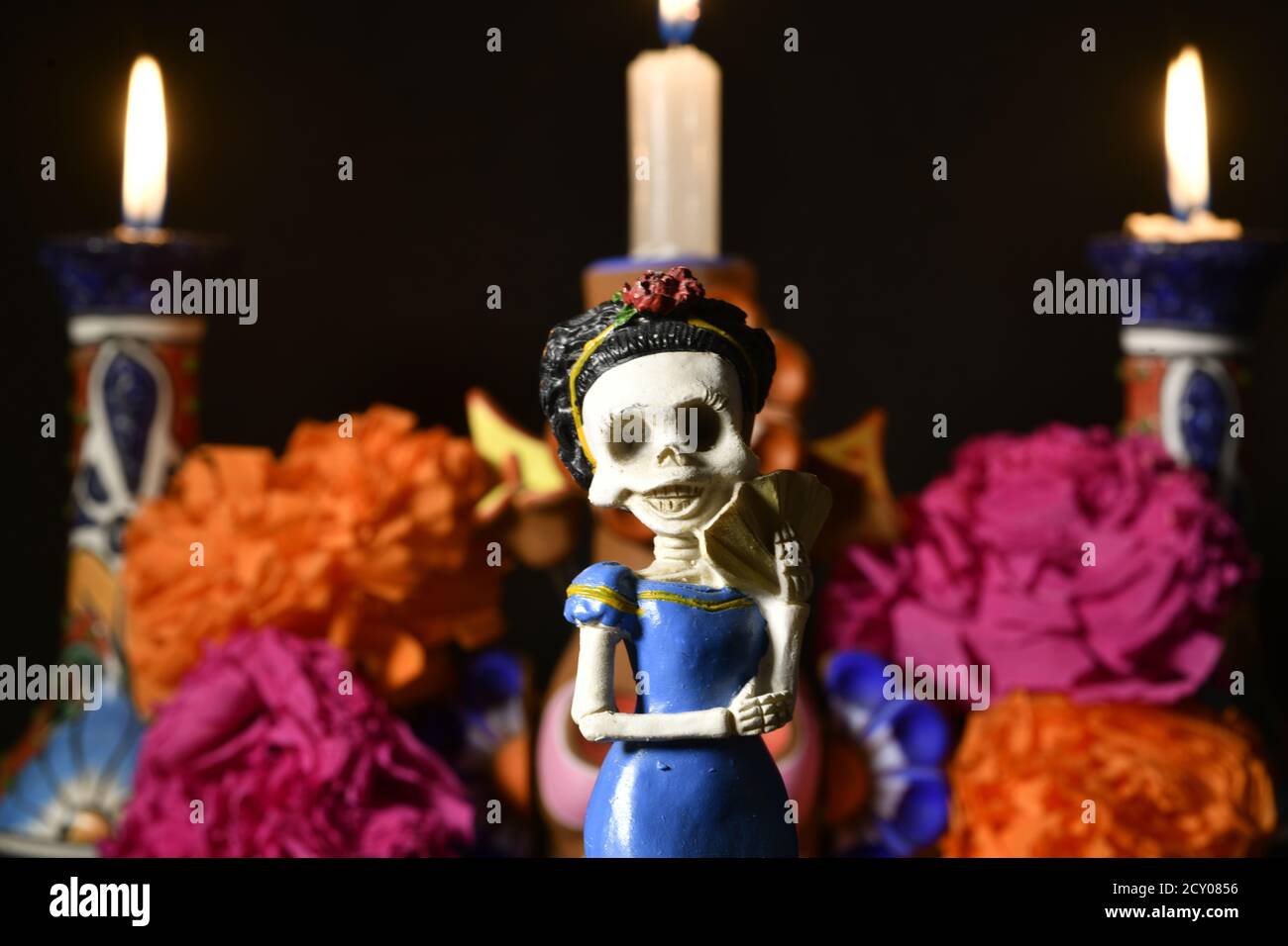 Closeup shot of plastic skulls female figurine for an offering of the day of the dead Stock Photo