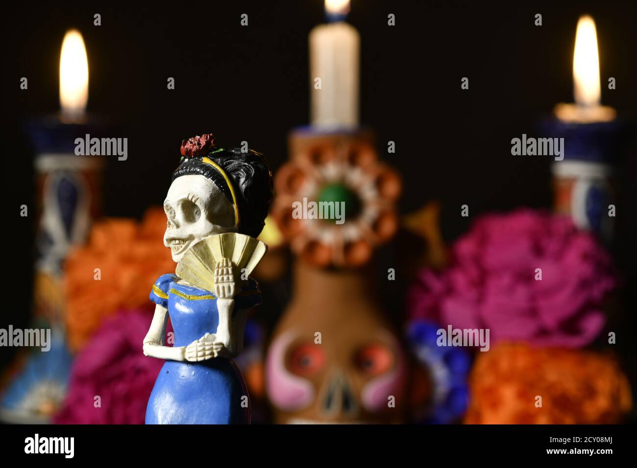 Closeup shot of plastic skulls female figurine for an offering of the day of the dead Stock Photo