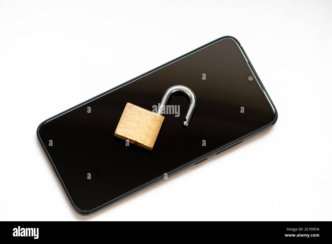 Vulnerable encryption and cyber security shows an open key lock on a black smartphone for hacker attack or cyber attack protection as safety business Stock Photo