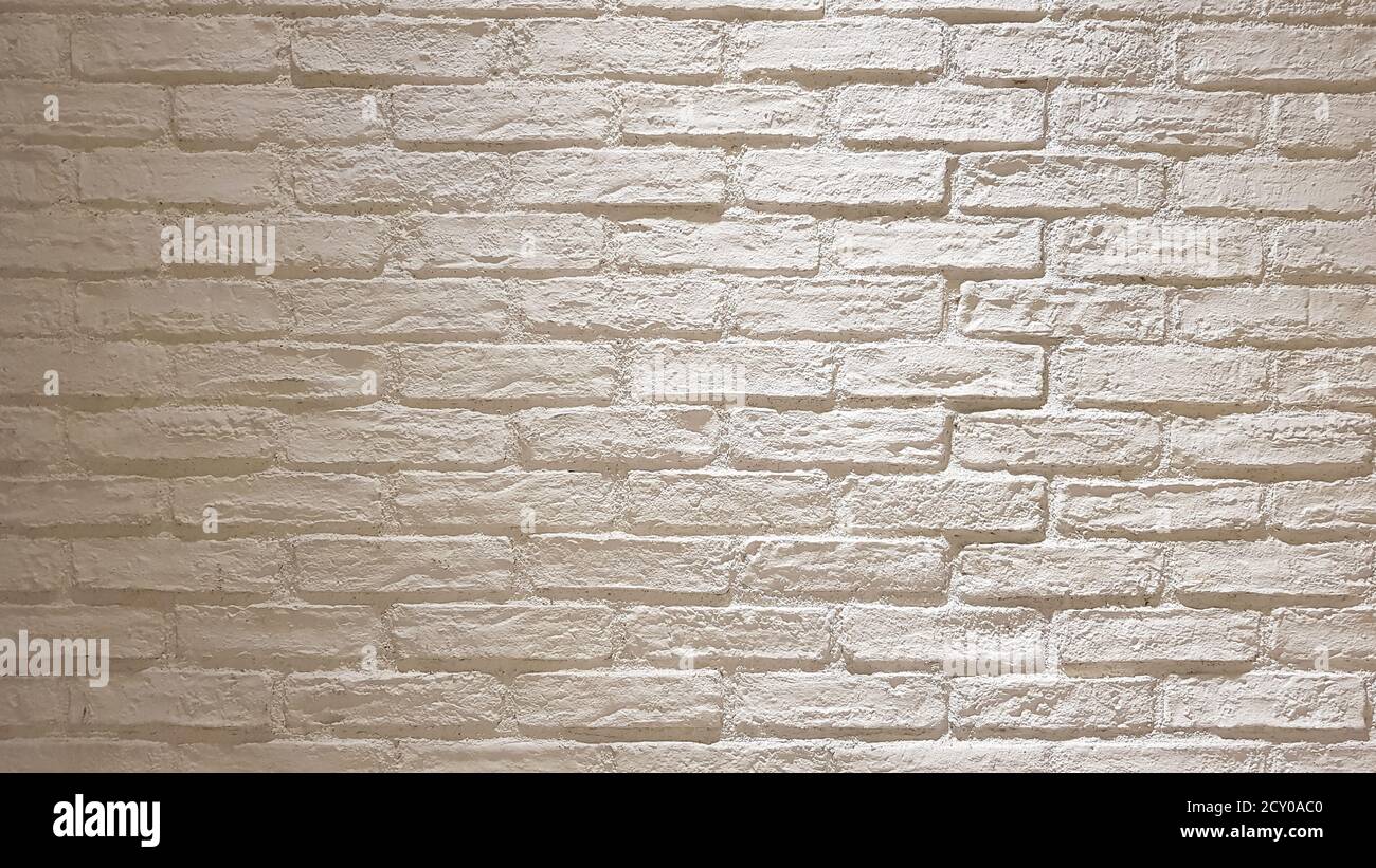 Modern white brick wall texture for background. Copy space for text or