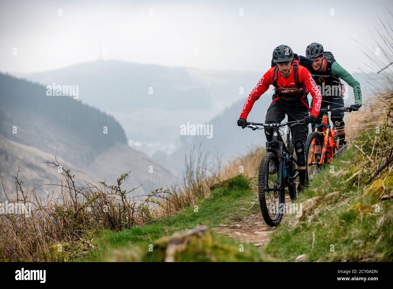 Two men ride mountain bikes on a trail at Glyncorrwg in the Afan Valley
