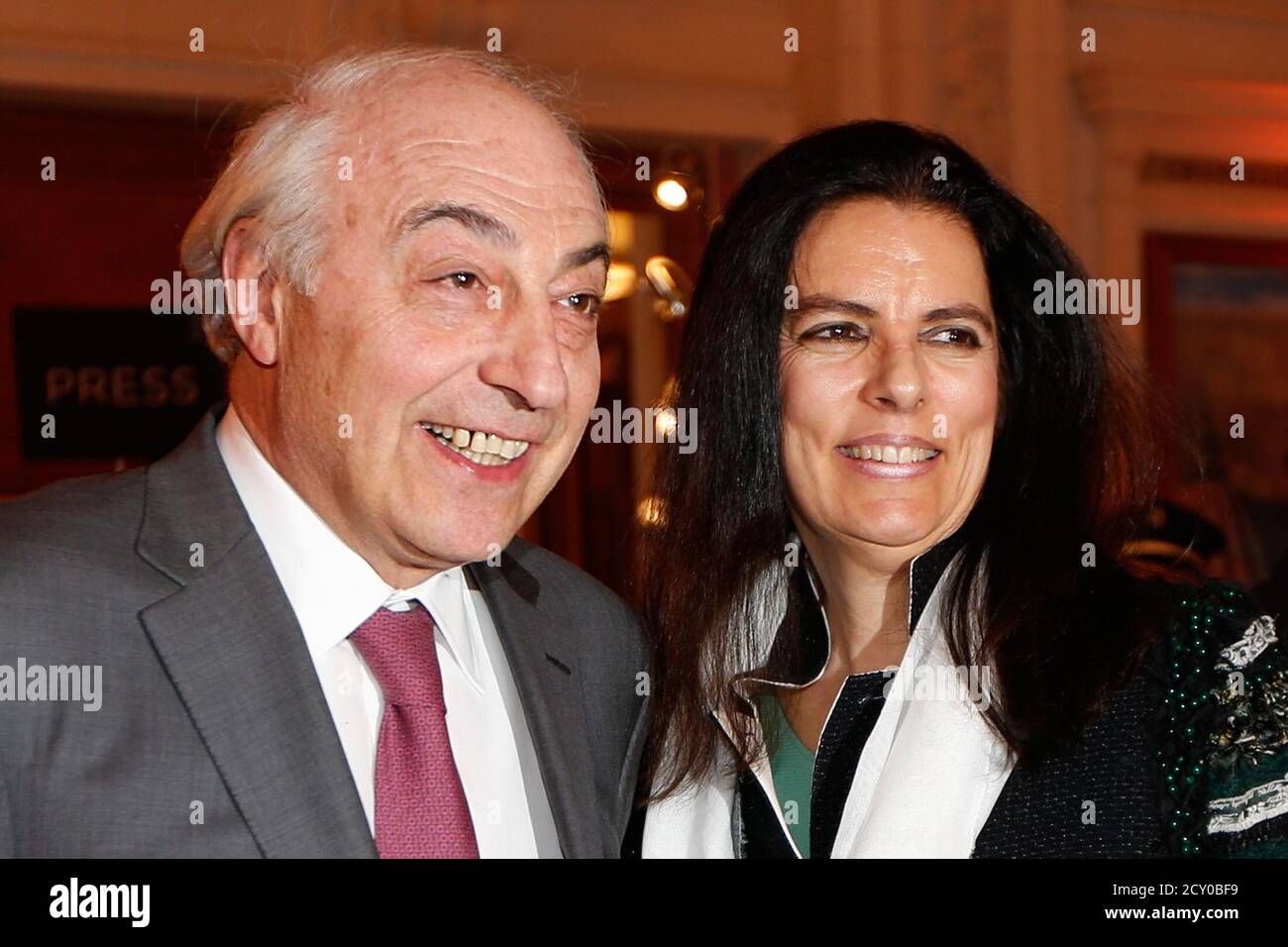 Francoise Bettencourt Meyers (R) and her husband Jean-Pierre Meyers arrive  to attend the L'Oreal-UNESCO prize for women in Science at the Sorbonne  University in Paris March 28, 2013. REUTERS/Charles Platiau (FRANCE -