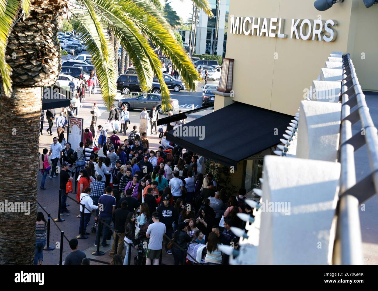 line to enter a Michael Kors store 