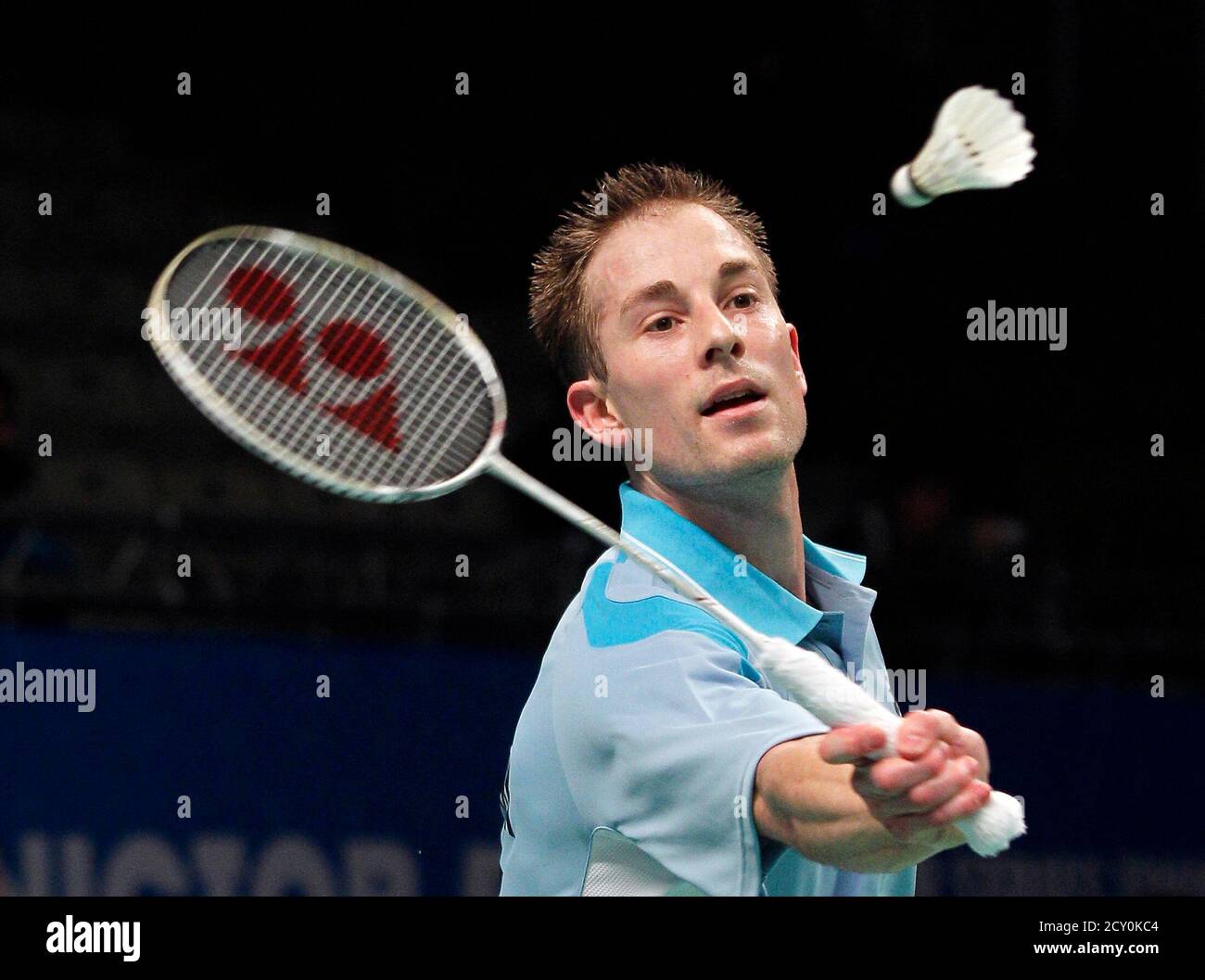 Denmark's Peter Hoeg Gade returns a shot to Malaysia's Lee Chong Wei in  their men's singles match in the preliminary round at the 2010 Badminton  World Federation Super Series finals at the