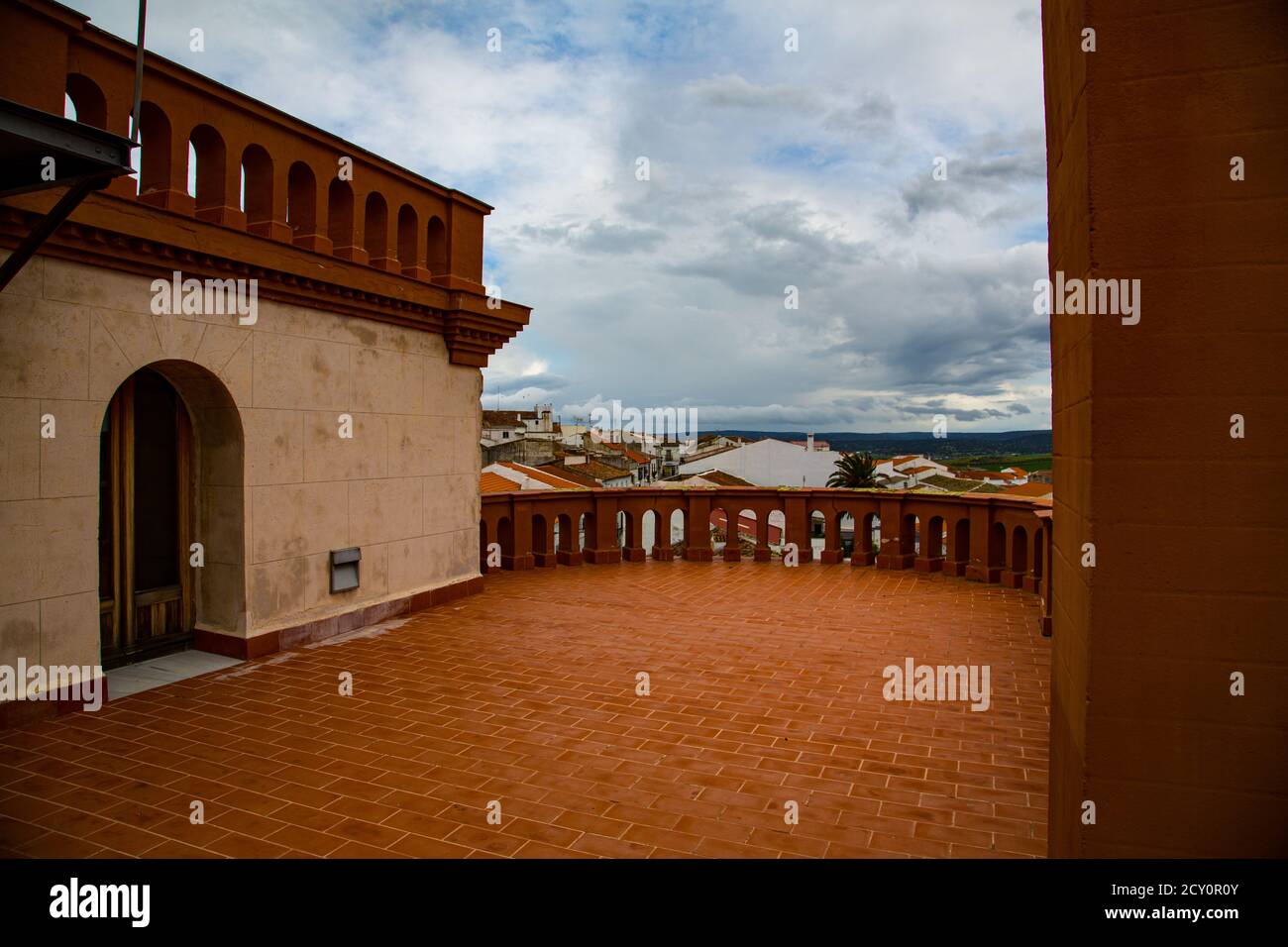 View of terrace and circular entrance with cloudy sky in the backgroun Stock Photo