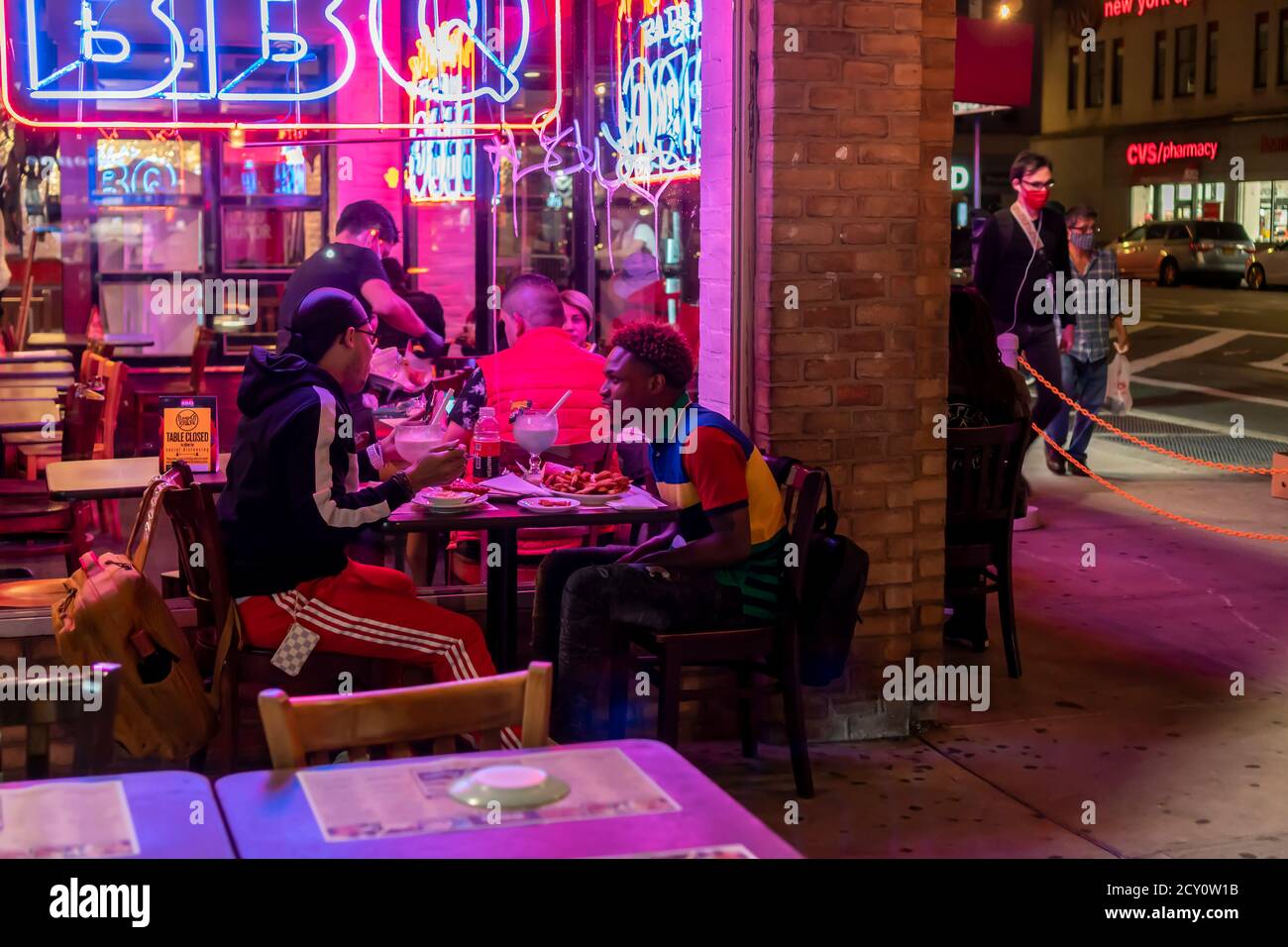 Indoor and outdoor dining at the Dallas BBQ restaurant in Chelsea in