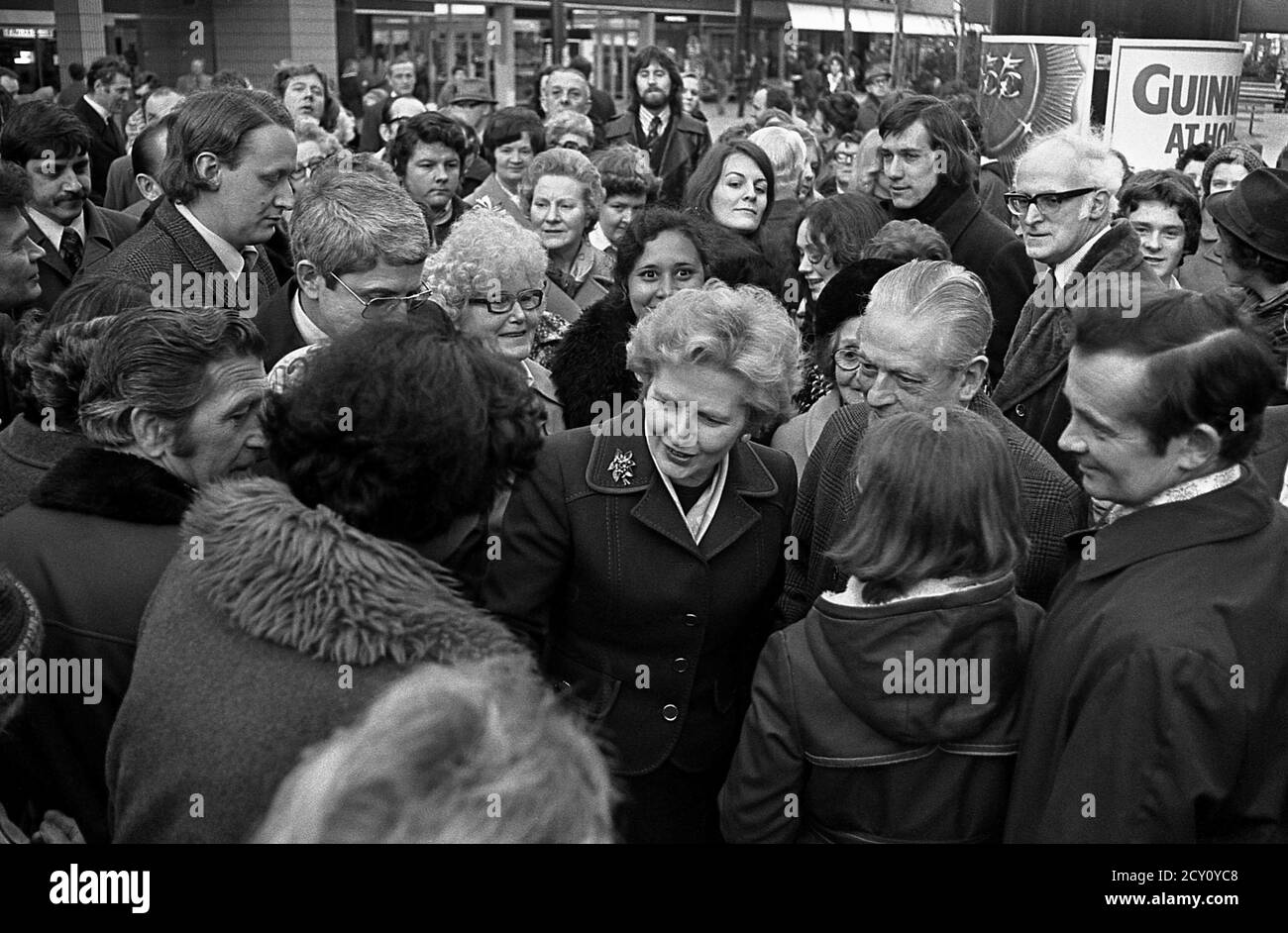 AJAXNETPHOTO.11TH FEBRUARY,1977. PORTSMOUTH, ENGLAND.  - CITY WALKABOUT - MRS MARGARET THATCHER (CON), LEADER OF THE OPPOSITION, ENGAGES WITH THE PUBLIC IN COMMERCIAL ROAD SHOPPING PRECINCT DURING A CAMPAIGN WALKABOUT. PHOTO:JONATHAN EASTLAND/AJAX REF:3771102 47 Stock Photo