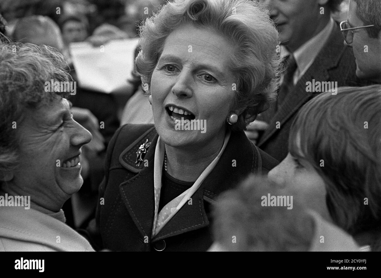 AJAXNETPHOTO.11TH FEBRUARY,1977. PORTSMOUTH, ENGLAND.  - CITY WALKABOUT - MRS MARGARET THATCHER (CON), LEADER OF THE OPPOSITION, ENGAGES WITH THE PUBLIC IN COMMERCIAL ROAD SHOPPING PRECINCT DURING A CAMPAIGN WALKABOUT. PHOTO:JONATHAN EASTLAND/AJAX REF:3771102 52 Stock Photo