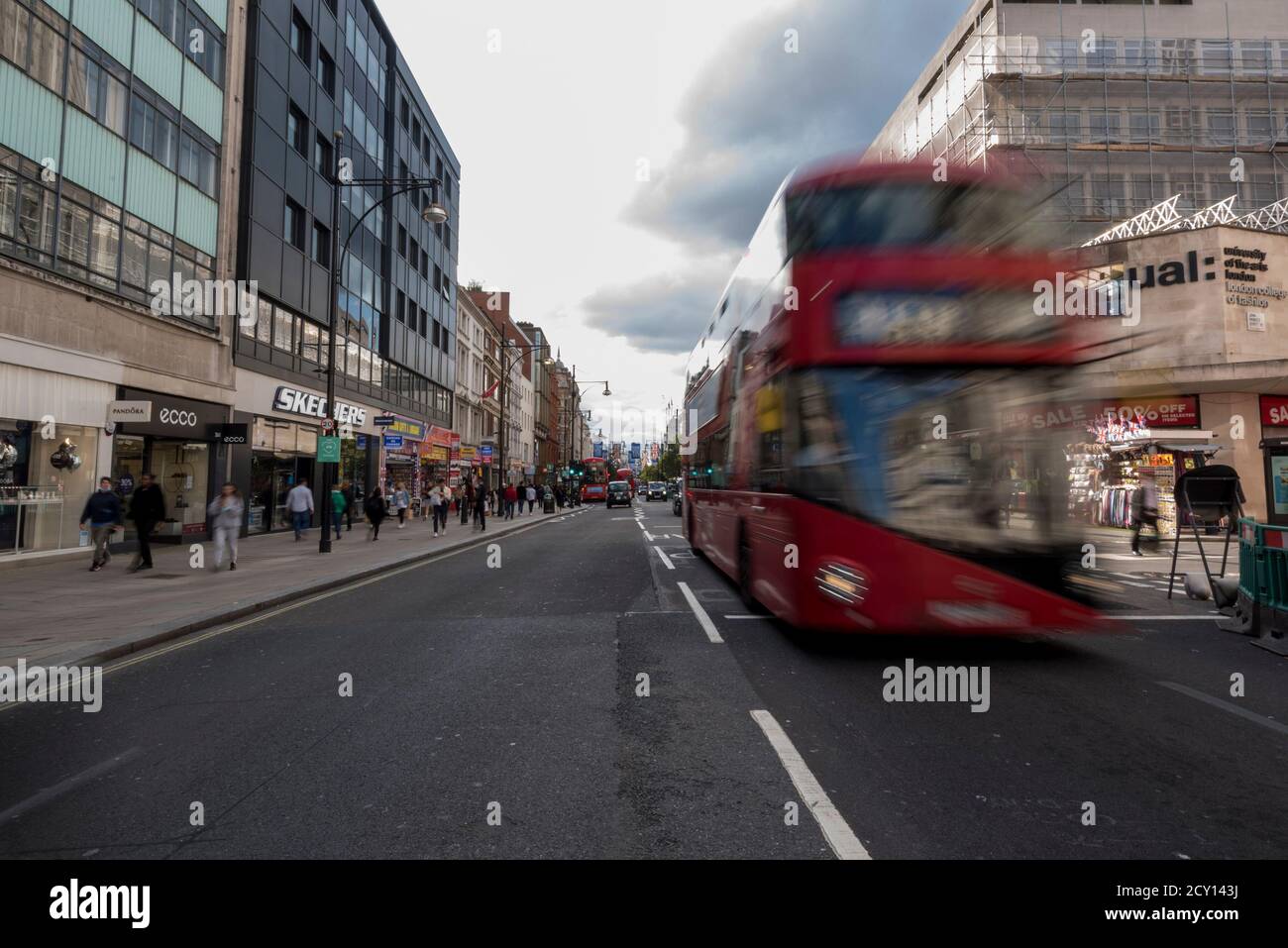 London, UK.  1 October 2020.  Traffic passes along Oxford Street, traditionally the busiest shopping street in the country, but as a result of the coronavirus pandemic, footfall has declined considerably.  Shoppers are preferring to shop online as people work from home.  Credit: Stephen Chung / Alamy Live News Stock Photo