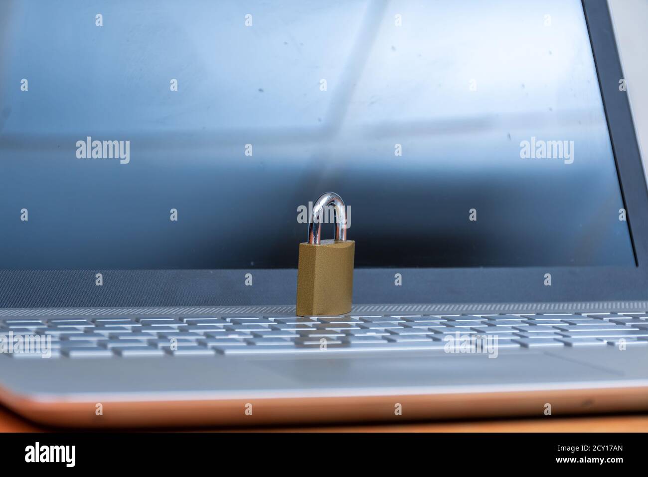 digital security concept with a padlock placed on a pc Stock Photo