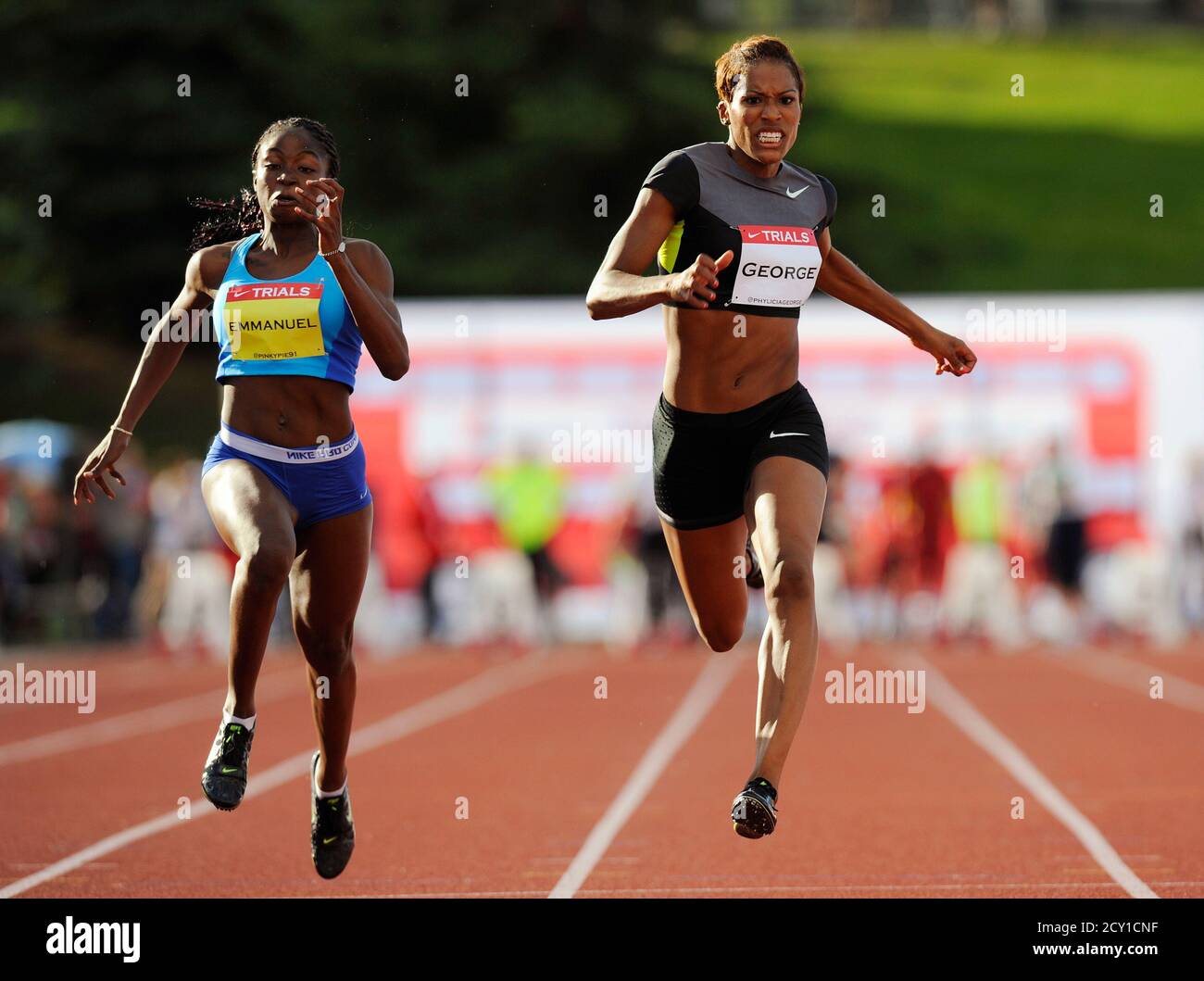 Phylicia George R Beats Crystal Emmanuel At The Finish Line To Win The Women S 100 Meter Final At The Canadian Track And Field Olympic Trials In Calgary Alberta June 29 2012 George