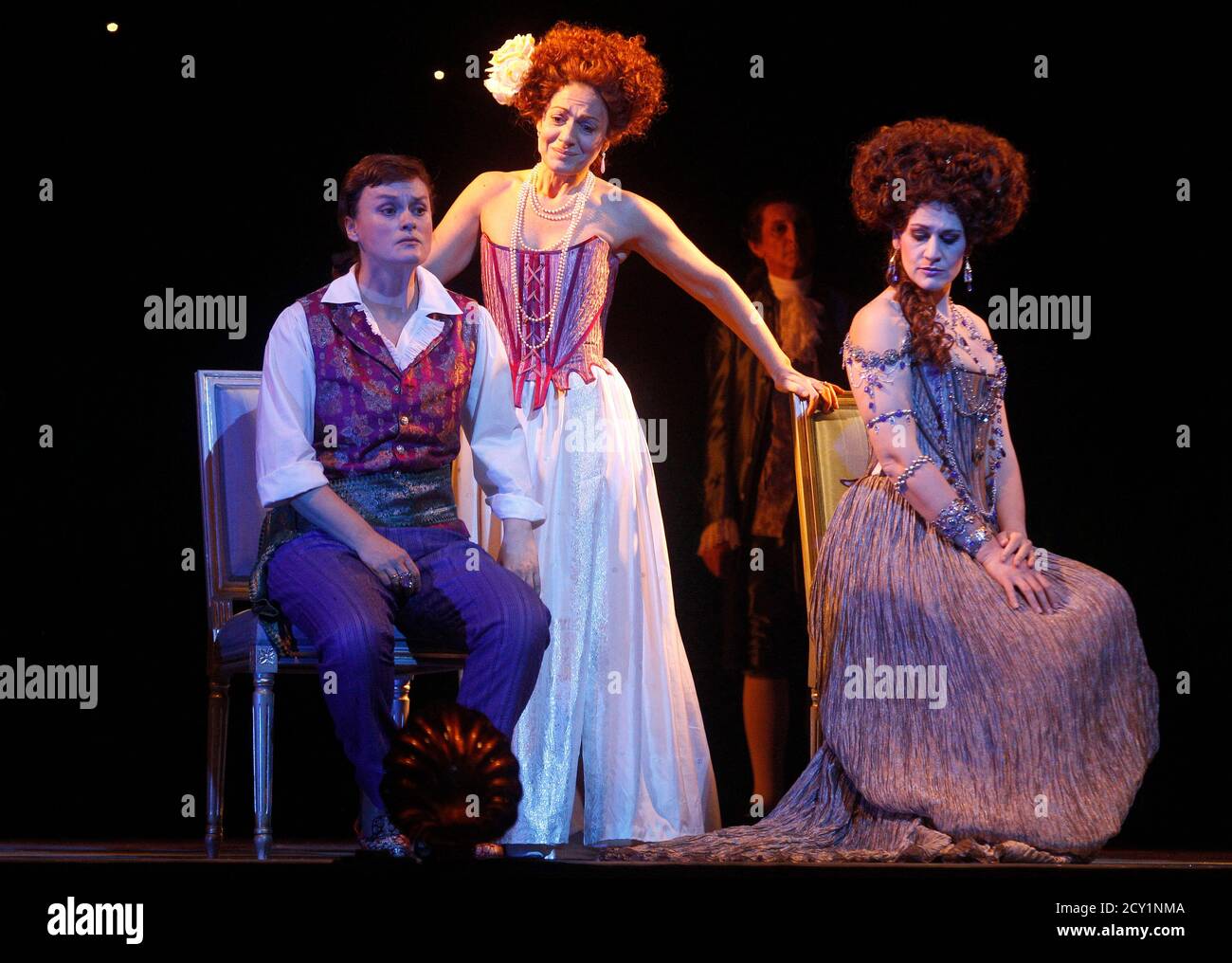 Singers Vesselina Kasarova, Veronica Cangemi and Anja Harteros (L-R) perform on stage as Ruggiero, Morgana and Alcina during a dress rehearsal of George Frideric Handel's opera 'Alcina' at the state opera house in Vienna November 10, 2010. The opera is conducted by Marc Minkowski and will premiere on November 14. REUTERS/Herwig Prammer (AUSTRIA - Tags: ENTERTAINMENT) Stock Photo