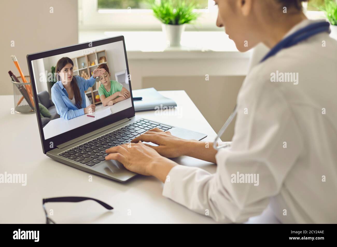 Online medicine mother son hi-res stock photography and images - Alamy