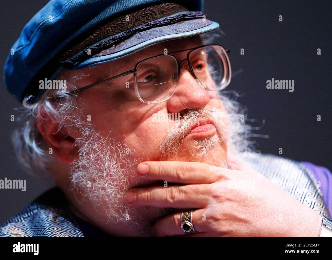 George R.R. Martin, author of the "Song of Ice and Fire" fantasy series  that is the basis of the television series "Game of Thrones", gestures  during his masterclass at the Neuchatel International