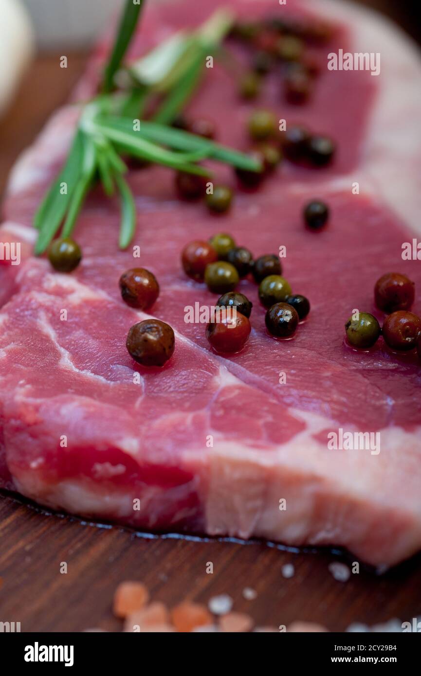 raw uncooked ribeye beef steak Stock Photo Alamy